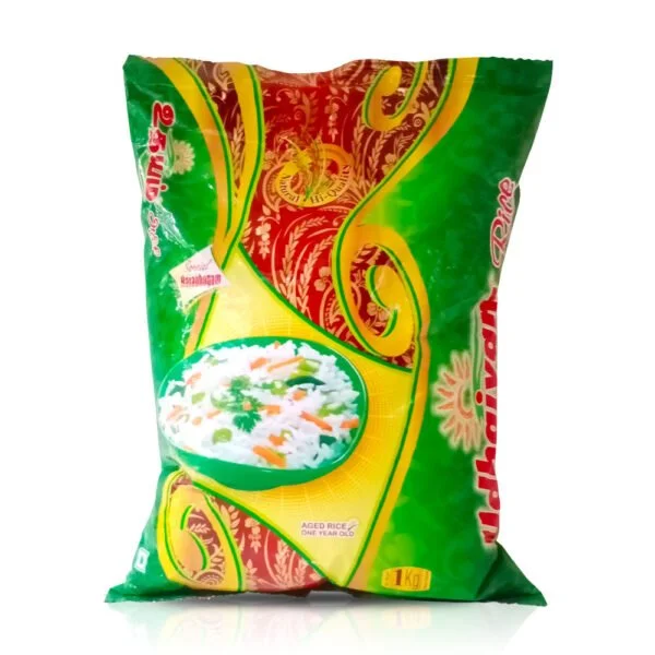 Udhaiyam Raw Rice Bag Of Udhaiyam Boiled Rice From &Quot;Dm Traders Organic Store&Quot; With Green, Red, And Yellow Design, Showing A Bowl Of Cooked Rice And Labelled As Aged Rice, 1 Kg.
