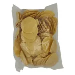 A packet of round, thin dried crackers in clear plastic packaging.Coins Appalam