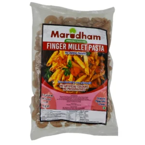 Packet of Maridham Finger Millet Pasta with the label displaying the product name, an image of cooked pasta, and information about no added maida, artificial colours, or preservatives.