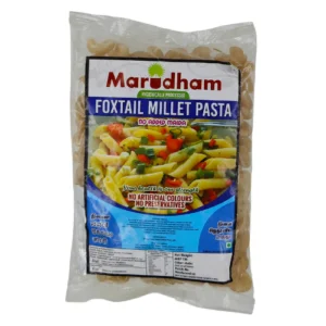Packet of Marudham Foxtail Millet Pasta with a colourful image of pasta on the front and nutritional information printed below.