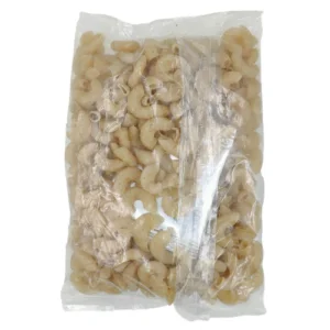 A sealed transparent plastic bag containing uncooked macaroni pasta.